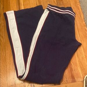 Women’s Bongo Navy Blue Joggers with white Stripes on the sides sized Medium